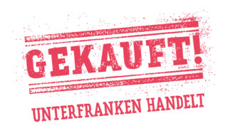 Ein Stempel mit dem Wort "GEKAUFT!" in großen Buchstaben, umgeben von einer roten Linie. Darunter steht "UNTERFRANKEN HANDELT" in kleinerer Schrift. Der Hintergrund ist weiß.